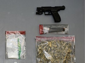 An Ontario police force displays a seized loaded firearm and illegal drugs.