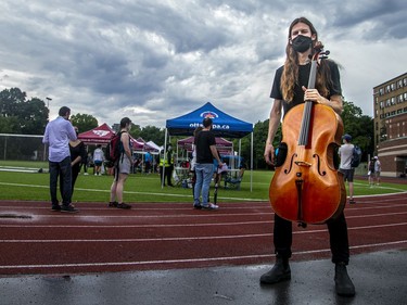 A cello player with Ottawa Chamberfest was one of a few musicians on site to entertain the crowd. The weather caused a slight pause in the performances but work arounds were quickly organized at Dr. Nili Kaplan-Myrth's third Jabapalooza held on the field at Immaculata High School, Saturday, June 5, 2021.