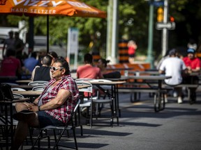 People were happy to be out enjoying the patios on Somerset Street, which is being closed to vehicle traffic on weekends again this summer.