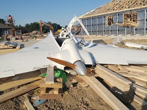 A Dutton resident was taken to hospital after a homebuilt plane crashed into a home under construction Thursday afternoon, Elgin OPP said. (Photo by Elgin County OPP)