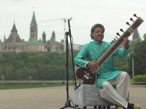Hardeep Buckshi on the sitar at the Canadian Museum of History. Eleven local musicians and groups joined forces on an inspiring version of George Harrison's Here Comes the Sun in a video recorded at locations around Ottawa and Gatineau to support the Shepherds of Good Hope.