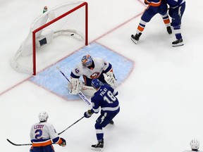 TAMPA, FLORIDA - JUNE 15: Ondrej Palat #18 of the Tampa Bay Lightning scores a goal on Semyon Varlamov #40 of the New York Islanders during the second period in Game Two of the Stanley Cup Semifinals in the 2021 Stanley Cup Playoffs at Amalie Arena on June 15, 2021 in Tampa, Florida.