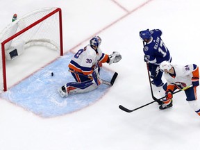 TAMPA, FLORIDA - JUNE 21:  Alex Killorn #17 of the Tampa Bay Lightning scores a goal past Ilya Sorokin #30 of the New York Islanders during the second period in Game Five of the Stanley Cup Semifinals during the 2021 Stanley Cup Playoffs at Amalie Arena on June 21, 2021 in Tampa, Florida.