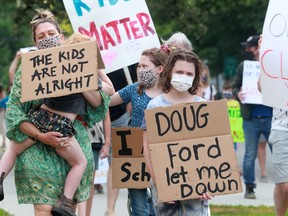 About a hundred students and parents showed up for a last-minute protest against school closures for the remainder of the year Friday outside Broadview Avenue Public School.