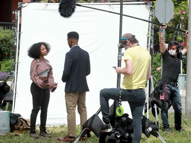 Here, one of the stars, Bresha Webb (left), shoots a scene with Brendan Jeffers amidst light and sound crew.