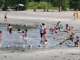 A photo taken June 7 shows children enjoying the water at Britannia Beach.