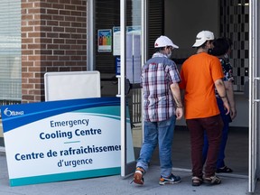 People enter the emergency cooling centre at the Ron Kolbus Lakeside Centre on Monday, June 7, 2021