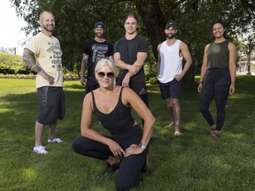 Pure Yoga and Pure Fit co-owner Amber Stratton with instructors (L-R) Todd Lavictoire, Peter Lavictoire, Randy Williams, Tarik Hassan, and Rudie Jiminez are thrilled that Ontario will be entering the second phase of reopening allowing them to resume outdoor classes.