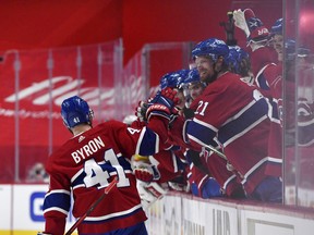 Montreal Canadiens forward Paul Byron (41) reacts with teammates after scoring a goal against the Vegas Golden Knights.