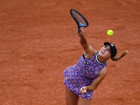 Sofia Kenin of the US serves the ball to Jessica Pegula of the US during their women's singles third round tennis match on Day 7 of The Roland Garros 2021 French Open tennis tournament in Paris