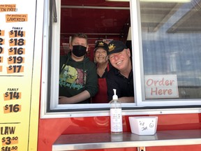 Steven Carle (right) with some of his staff at Almighty Cheese food truck on Trim Road in Orleans