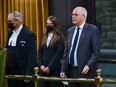 President of the Public Health Agency of Canada Iain Stewart, right, approaches the bar in the House of Commons to be admonished by the Speaker Anthony Rota on June 21, 2021.