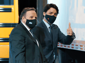 Prime Minister Justin Trudeau gives a thumbs up in March as he leaves a news conference with Quebec Premier François Legault, whose province's Bill 96 does more than chip away at minority rights, Chris Selley writes.