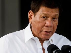 Philippine President Rodrigo Duterte speaks during the arrival ceremony for the first COVID-19 vaccines to arrive in the country, at Villamor Air Base in Pasay, Metro Manila, Philippines, on February 28, 2021.