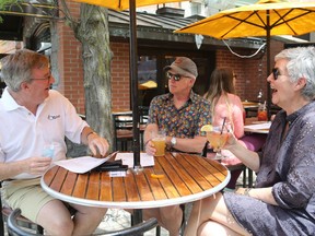 Ottawa Mayor Jim Watson was one of the patio earlybirds Friday when he had lunch at the Lieutenant's Pump on Elgin Street with his sister, Jayne Watson, and her husband, Peter Froislie.