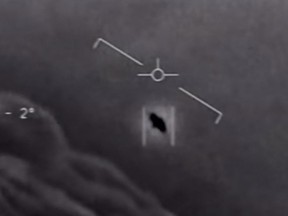 (FILES) This file video grab image obtained April 28, 2020 courtesy of the US Department of Defense shows part of an unclassified video taken by Navy pilots that have circulated for years showing interactions with "unidentified aerial phenomena". - Are aliens watching us?