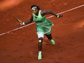 Serena Williams of the US returns the ball to Kazakhstan's Elena Rybakina during their women's singles fourth round tennis match on Day 8 of The Roland Garros 2021 French Open tennis tournament in Paris on June 6, 2021.