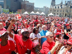 Canadians celebrate during Canada Day festivities on Parliament Hill on July 1, 2019. The Ottawa police expect there will be crowds gathering downtown and, possibly, in other parts of the city on Canada Day this year.