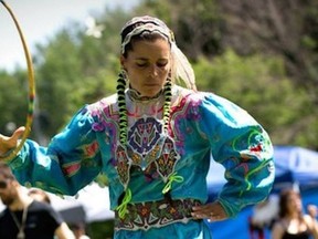 Celina Cada-Matasawagon is seen here hoop dancing at a powwow before the pandemic sent her performances online.
