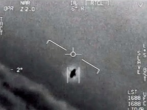 An undated handout image taken from a video released by the Defence Department’s Advanced Aerospace Threat Identification Program shows a 2004 encounter near San Diego between two Navy F/A-18F fighter jets and an unknown object.