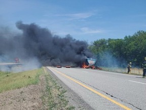 A tractor trailer burns beside Highway 401 west of Cornwall on Monday, June 7, 2021. OPP/Twitter