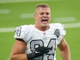 FILE PHOTO: Las Vegas Raiders defensive end Carl Nassib celebrates at the end of the game against the Los Angeles Chargers at SoFi Stadium in Inglewood, California, U.S. November 8, 2020.