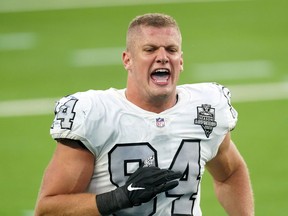 FILE PHOTO: Las Vegas Raiders defensive end Carl Nassib celebrates at the end of the game against the Los Angeles Chargers at SoFi Stadium in Inglewood, California, U.S. November 8, 2020.