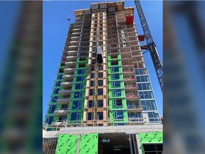 Rescue teams were called to the 21st floor on a construction site Monday to rescue a worker apparently suffering from heat-related issues.