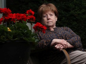 Sheila Logan poses for a photo outside her home in Ottawa Thursday. Sheila is unable to get one of the mRNA vaccines because of the risk of anaphylaxis.