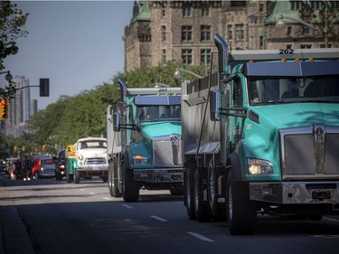 OTTAWA -- June 20, 2021 -- In recognition of the first 215 children discovered, a truck rally was held Sunday, June 20, 2021. The large group of trucks started at Thomas Cavanagh Construction in Ashton Station and made their way downtown, passing Parliament Hill Sunday morning. ASHLEY FRASER, POSTMEDIA
