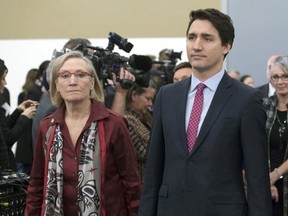 Files: Indigenous and Northern Affairs Minister Carolyn Bennett accompanies Prime Minister Justin Trudeau at a government function in Ottawa.