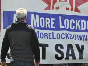 Lanark, Frontenac, Kingston Independent MPP Randy Hillier looked on as a truck pulling a large anti-lockdown sign made its way to the protest on Saturday May 1, 2021 in Cornwall, Ont. Francis Racine/Cornwall Standard-Freeholder/Postmedia Network