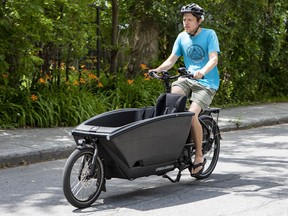 Ottawa's Chris Taggart shows off his family's e-cargo bike.