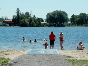 Files: Baxter Conservation Area beach is popular with families along the Rideau River - a little sandy haven nestled amongst the shore homes in the area.