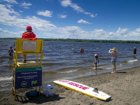 A lifeguard watches over Westboro Beach recently. Ottawans can expect some ideal weather for outdoors activities Thursday and Friday.
