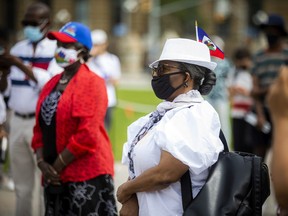 Members of the Haitian community from Ottawa and Gatineau gathered on Parliament Hill for a vigil for Haiti on Saturday.