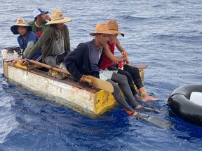 Five Cuban migrants aboard a makeshift vessel approximately 15 miles off the coast of Islamorada, Florida on July 24.