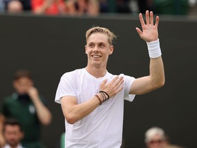 Denis Shapovalov of Canada celebrates victory after winning his Men's Singles Fourth Round match against Roberto Bautista Agut of Spain during Day Seven of The Championships at Wimbledon.