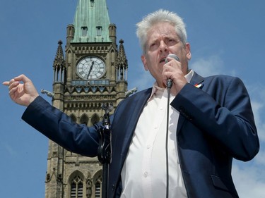 Hundreds joined MPs Charlie Angus (pictured) and Mumilaaq Qaqqaq and Indigenous elders for a march  from Parliament Hill on Saturday.