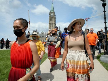 Hundreds joined MPs Mumilaaq Qaqqaq (pictured at left) and Charlie Angus and Indigenous elders for the march from Parliament Hill on Saturday.
