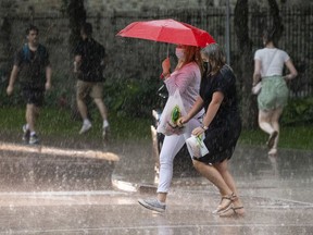 Running for cover from the heavy rainfall was a common fate for people in downtown Ottawa on Tuesday.