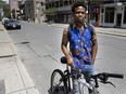 Prodil Houanhou, 27-year-old sound engineer, says he was roughed up and ticketed by Montreal police for stopping to observe an arrest. He is seen in Montreal on Sunday, July 4, 2021.