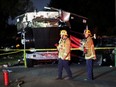 A damaged vehicle is seen at the site of an explosion after police attempted to safely detonate illegal fireworks that were seized, in Los Angeles.