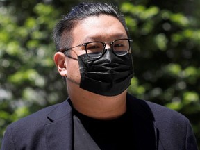 Ng Yu Zhi, a director of Envy Global Trading, arrives at the State Court in Singapore.