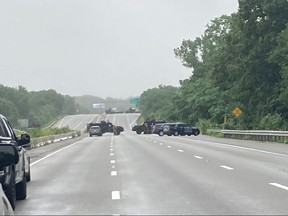 Massachusetts State Police vehicles block Route 95 after an armed standoff between 8 to 10 militia members and police forced the closure of the U.S. interstate highway, in Wakefield, Massachusetts.