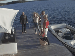 Screen shot of security video shows Linda O'Leary (second from left), wife of celebrity investor Kevin O'Leary (left), with their speedboat on the evening of the fatal crash.