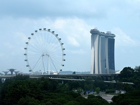 A general view shows the Singapore Flyer and the Marina Bay Sands hotel in Singapore. Talk about a big wheel.