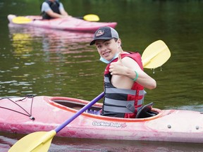 Jack, a camper, kayaks at Arrowhead Camp on Lake of the Bays about 320 kilometres west of Ottawa. The overnight summer camp has been allowed to open this year, to the delight of staff and campers.