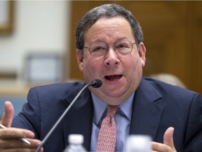 FILE - In this May 8, 2014, file photo David Cohen, Executive Vice President, Comcast Corporation testifies during the House Judiciary Subcommittee/