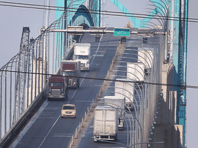 Traffic on the Ambassador Bridge, which connects Windsor, Ont., with Detroit, Michigan, on Tuesday, February 9, 2021.